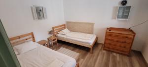 Posteľ alebo postele v izbe v ubytovaní Zrínyi 11 Apartments