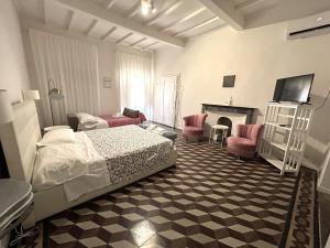 Postel nebo postele na pokoji v ubytování Allegra Toscana - Affittacamere Guest house Arezzo