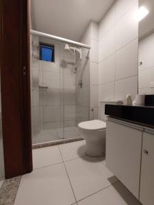 Ванна кімната в Iloa Residence 2quartos Luxo
