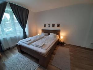 Posteľ alebo postele v izbe v ubytovaní Zrínyi 11 Apartments