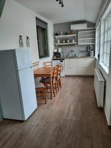 Kuchyňa alebo kuchynka v ubytovaní Zrínyi 11 Apartments