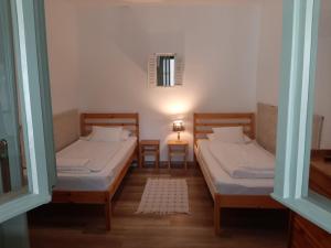 Posteľ alebo postele v izbe v ubytovaní Zrínyi 11 Apartments