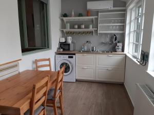 Kuchyňa alebo kuchynka v ubytovaní Zrínyi 11 Apartments