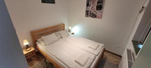 Posteľ alebo postele v izbe v ubytovaní Zrínyi 11 Apartments