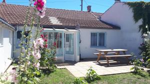 Vonkajšia záhrada v ubytovaní Maison de vacances familiale