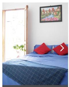 Postel nebo postele na pokoji v ubytování Ramos Room