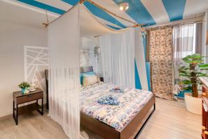 Posteľ alebo postele v izbe v ubytovaní Aloha Home
