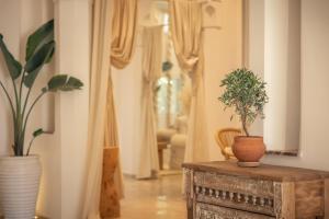 Koupelna v ubytování Les Palmiers Boutique Hôtel & Spa