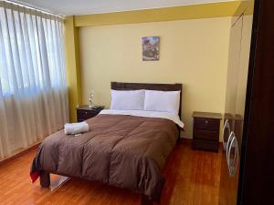 Postelja oz. postelje v sobi nastanitve Pachamama Hostel