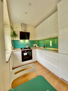 Kuchyň nebo kuchyňský kout v ubytování Smelte Studio Apartment