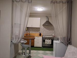 Köök või kööginurk majutusasutuses MONOLOCALE Hippy Olly