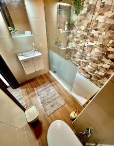 Bagno di Cozy appartament sea view