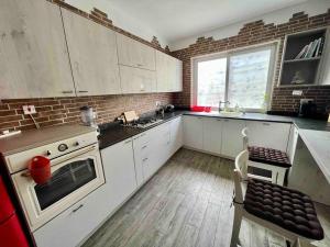 Cucina o angolo cottura di Cozy appartament sea view