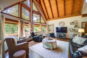 a living room filled with furniture and a tv at Butler Retreat on 60 Acres Near Beech Mountain! in Beech Mountain