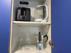A kitchen or kitchenette at Lorentz Holiday Home