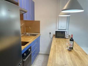 A kitchen or kitchenette at Lorentz Holiday Home