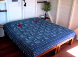 Voodi või voodid majutusasutuse El Momo Cottages toas