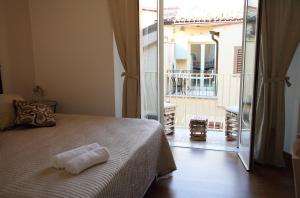 A bed or beds in a room at B&B Evelyne