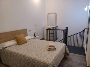 Posteľ alebo postele v izbe v ubytovaní Apartamento en el casco antiguo en plena Alameda