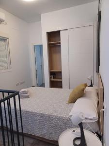 Posteľ alebo postele v izbe v ubytovaní Apartamento en el casco antiguo en plena Alameda