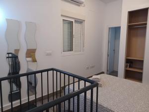 Posteľ alebo postele v izbe v ubytovaní Apartamento en el casco antiguo en plena Alameda