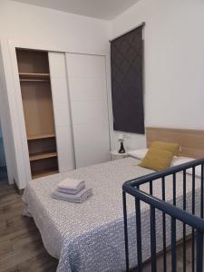 Posteľ alebo postele v izbe v ubytovaní Apartamento en el casco antiguo en plena Alameda