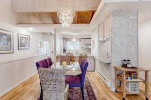 a kitchen and dining room with a table and chairs at Mountain Shadows in Incline Village