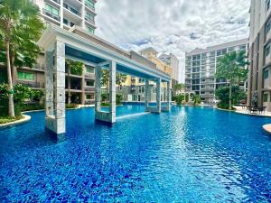 Mynd úr myndasafni af Arcadia Condo with Pool access-E & Gym-Sauna and Fast NET í Pattaya South