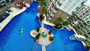 Mynd úr myndasafni af Arcadia Condo with Pool access-E & Gym-Sauna and Fast NET í Pattaya South