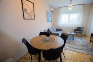 Prostor za sedenje u objektu Apartman Iris