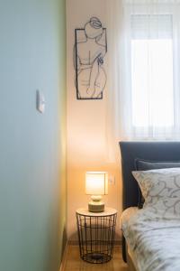 Krevet ili kreveti u jedinici u okviru objekta Apartman Iris