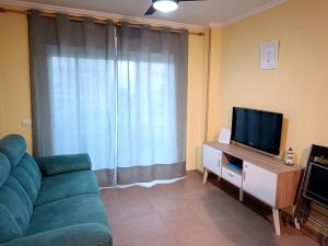 TV a/nebo společenská místnost v ubytování Romántico Daimús 2