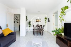 a living room with a couch and a table at The Sea View Candelaria, by Nivariahost in Candelaria