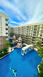 Mynd úr myndasafni af Arcadia Condo with Pool access-E & Gym-Sauna and Fast NET í Pattaya South