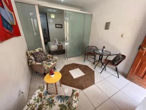 Uma área de estar em Cusco Rooms