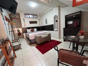 Uma cama ou camas num quarto em Cusco Rooms