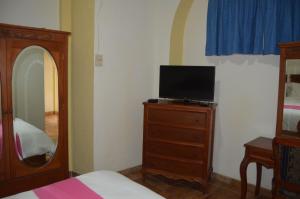 Postel nebo postele na pokoji v ubytování Hotel Meson del Mar
