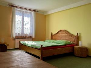 Postel nebo postele na pokoji v ubytování Johannova Bouda