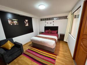 Uma cama ou camas num quarto em Cusco Rooms