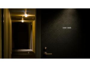 a door leading to a hallway with a mirror at GRIDS Premium Hotel Otaru - Vacation STAY 68543v in Otaru +24 photos