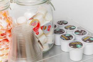 a jar of marshmallows and other food items in a refrigerator at Luxury 6BR Home in Brooklyn in Brooklyn