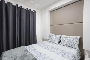 Katil atau katil-katil dalam bilik di SanLoft Expo Inn Tietê 04