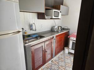 Dapur atau dapur kecil di Casa de hóspedes em Buzios