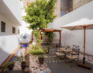 Um pátio ou outra área exterior em Hotel Blanco Riad