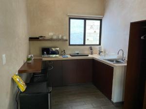 Kuchyň nebo kuchyňský kout v ubytování Hotelito YUM KAAX