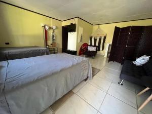 Voodi või voodid majutusasutuse Hotel Azul Coral toas