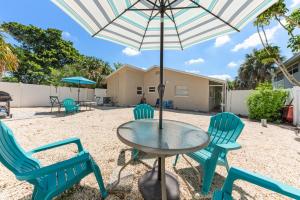 En terrasse eller udendørsområde på Charming Beach Villa B