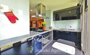 a kitchen with a sink and a counter top at W8 Condo 2Bedroom Luxury Private floor Penthouse in Central BKK in Bangkok