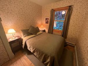 Cama o camas de una habitación en La maison d'Alphonsine