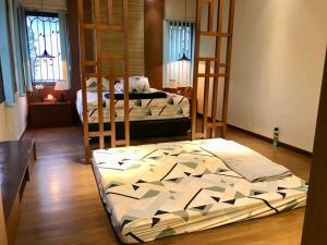 a bedroom with two bunk beds in a room at Villa Little Ubud in Gadok 1 +38 photos